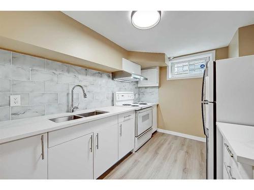 2045 Cottonwood Crescent Se, Calgary, AB - Indoor Photo Showing Kitchen With Double Sink