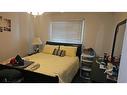 11025 24 Street Sw, Calgary, AB  - Indoor Photo Showing Bedroom 