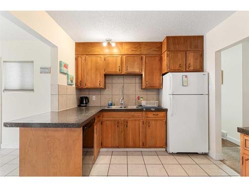 2822 40 Street Sw, Calgary, AB - Indoor Photo Showing Kitchen With Double Sink