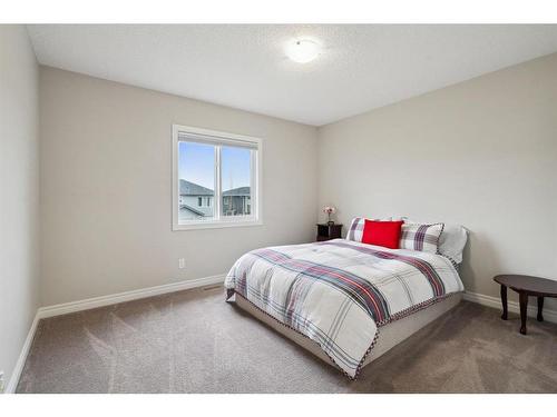 32 Cranbrook Circle Se, Calgary, AB - Indoor Photo Showing Bedroom