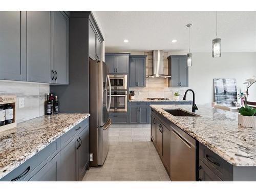 32 Cranbrook Circle Se, Calgary, AB - Indoor Photo Showing Kitchen With Upgraded Kitchen