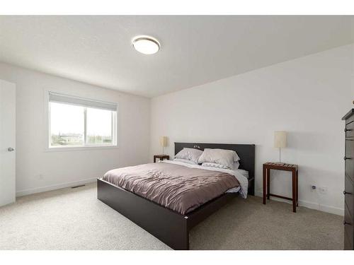 9 Cougar Ridge Cove Sw, Calgary, AB - Indoor Photo Showing Bedroom