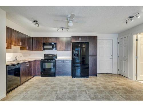 5211-279 Copperpond Common Se, Calgary, AB - Indoor Photo Showing Kitchen