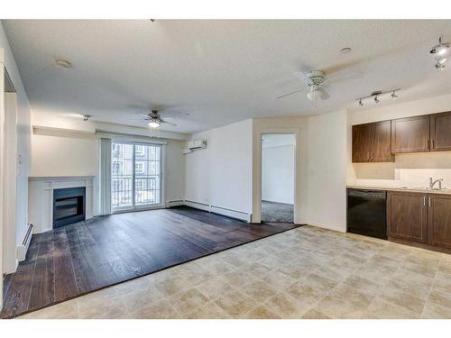 5211-279 Copperpond Common Se, Calgary, AB - Indoor With Fireplace