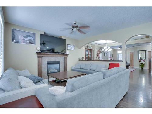 523 Taralake Way Ne, Calgary, AB - Indoor Photo Showing Living Room With Fireplace