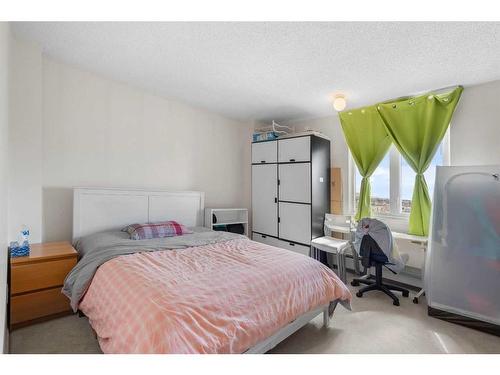 1112-4944 Dalton Drive Nw, Calgary, AB - Indoor Photo Showing Bedroom