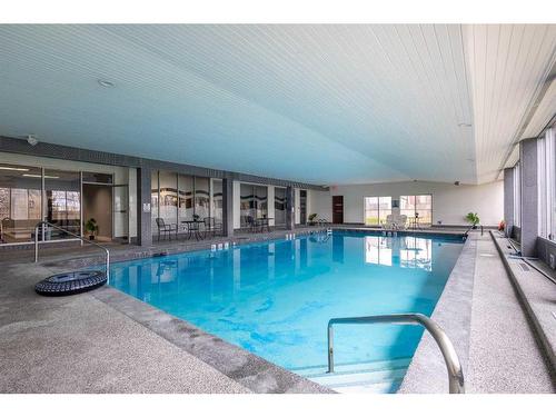 1112-4944 Dalton Drive Nw, Calgary, AB -  Photo Showing Other Room With In Ground Pool