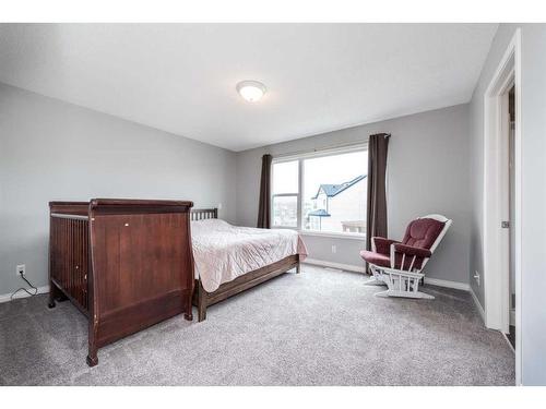 9 Copperpond Link Se, Calgary, AB - Indoor Photo Showing Bedroom