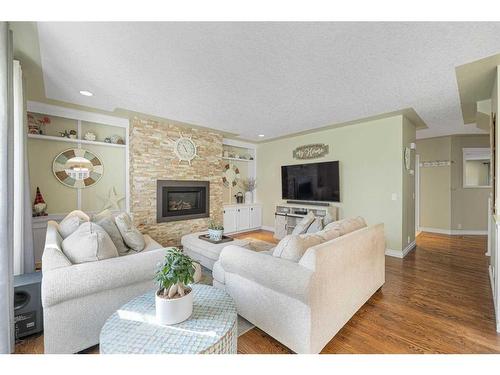 110 Mt Robson Close Se, Calgary, AB - Indoor Photo Showing Living Room With Fireplace
