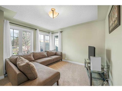 110 Mt Robson Close Se, Calgary, AB - Indoor Photo Showing Living Room