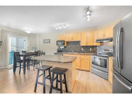 276-371 Marina Drive, Chestermere, AB - Indoor Photo Showing Kitchen With Double Sink