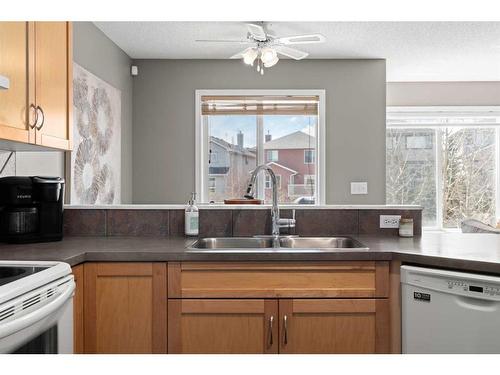 29 Royal Oak Gardens Nw, Calgary, AB - Indoor Photo Showing Kitchen With Double Sink