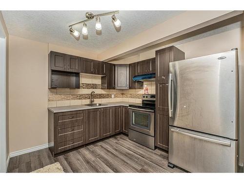 42 Panora Street Nw, Calgary, AB - Indoor Photo Showing Kitchen With Stainless Steel Kitchen