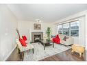 42 Panora Street Nw, Calgary, AB  - Indoor Photo Showing Living Room With Fireplace 