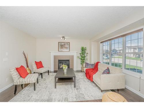 42 Panora Street Nw, Calgary, AB - Indoor Photo Showing Living Room With Fireplace