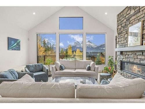 628 Silvertip Road, Canmore, AB - Indoor Photo Showing Living Room With Fireplace