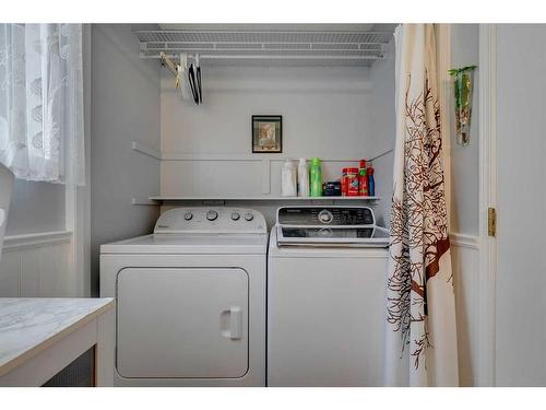 338 Millrise Drive Sw, Calgary, AB - Indoor Photo Showing Laundry Room