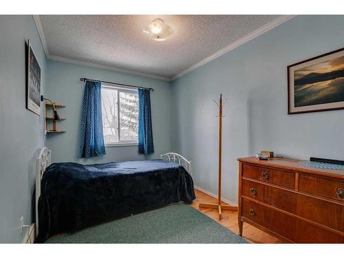 338 Millrise Drive Sw, Calgary, AB - Indoor Photo Showing Bedroom