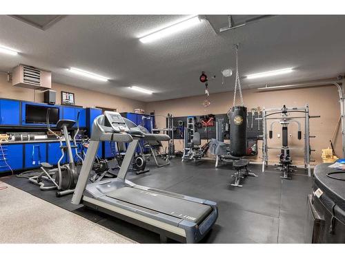 3001 10 Street, Didsbury, AB - Indoor Photo Showing Gym Room