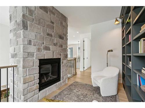 627 Willow Brook Drive Se, Calgary, AB - Indoor Photo Showing Living Room With Fireplace
