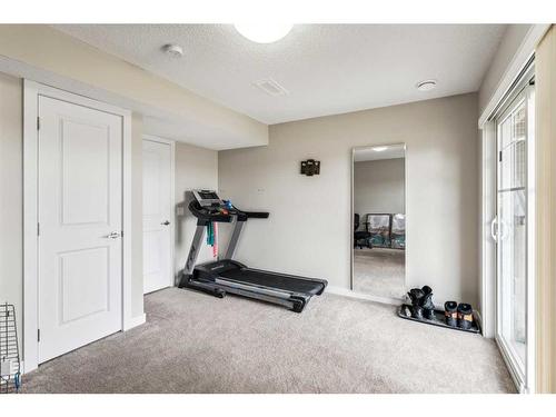 514 Sage Hill Grove Nw, Calgary, AB - Indoor Photo Showing Gym Room