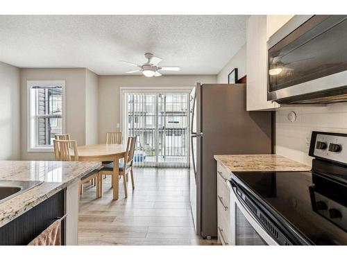 514 Sage Hill Grove Nw, Calgary, AB - Indoor Photo Showing Kitchen With Upgraded Kitchen