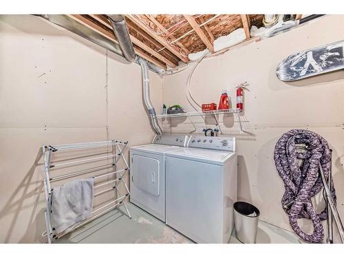 75 Bridlecrest Road Sw, Calgary, AB - Indoor Photo Showing Laundry Room