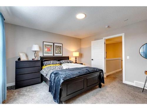 137 Creekside Boulevard Sw, Calgary, AB - Indoor Photo Showing Bedroom