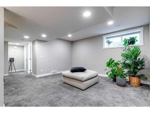 137 Creekside Boulevard Sw, Calgary, AB - Indoor Photo Showing Other Room