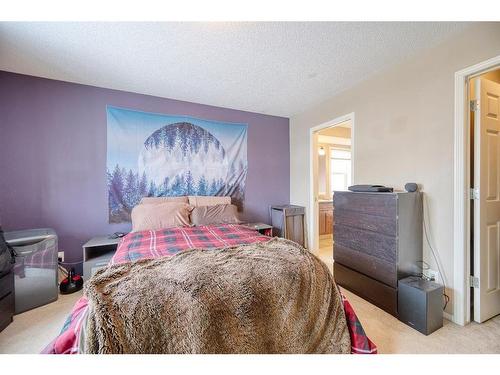 913 Cranston Drive Se, Calgary, AB - Indoor Photo Showing Bedroom