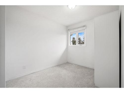 116 Stradwick Rise Sw, Calgary, AB - Indoor Photo Showing Other Room