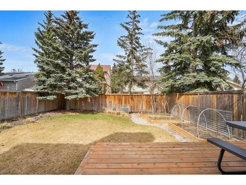 116 Stradwick Rise Sw, Calgary, AB - Outdoor With Deck Patio Veranda With Backyard