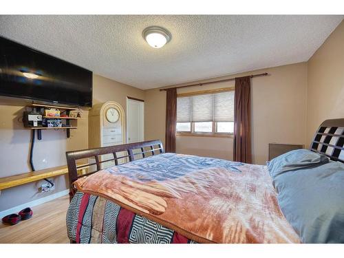 36 Taylor Way Se, Airdrie, AB - Indoor Photo Showing Bedroom