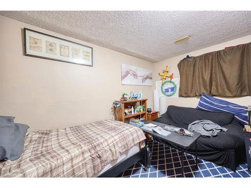 36 Taylor Way Se, Airdrie, AB - Indoor Photo Showing Bedroom
