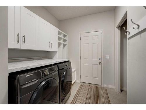 15 Cranleigh Mews Se, Calgary, AB - Indoor Photo Showing Laundry Room