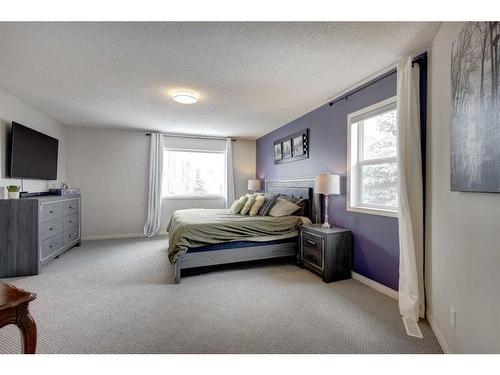 15 Cranleigh Mews Se, Calgary, AB - Indoor Photo Showing Bedroom