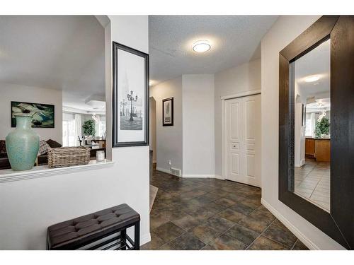 15 Cranleigh Mews Se, Calgary, AB - Indoor Photo Showing Living Room With Fireplace