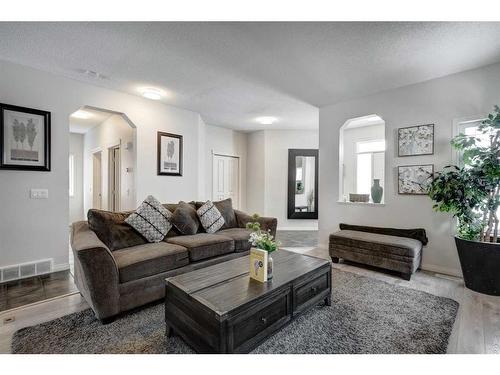 15 Cranleigh Mews Se, Calgary, AB - Indoor Photo Showing Living Room