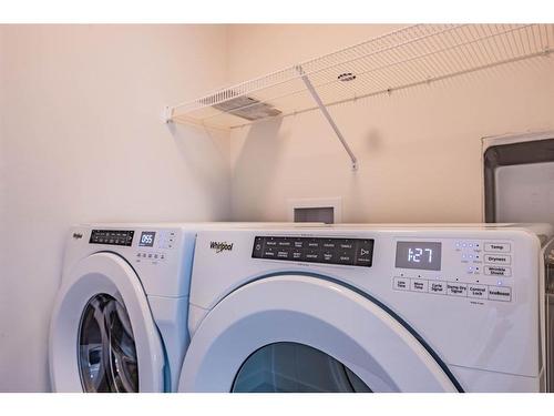 220 Hotchkiss Drive, Calgary, AB - Indoor Photo Showing Laundry Room