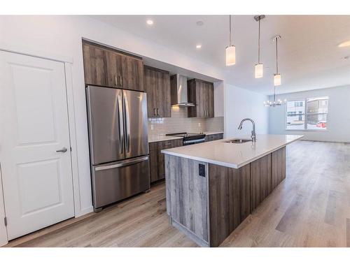 220 Hotchkiss Drive, Calgary, AB - Indoor Photo Showing Kitchen With Upgraded Kitchen