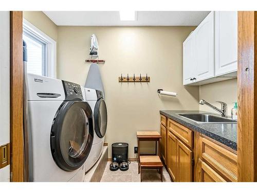 38 Crystalridge Way, Okotoks, AB - Indoor Photo Showing Laundry Room