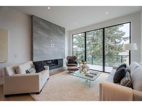 2226 8 Street Ne, Calgary, AB - Indoor Photo Showing Living Room With Fireplace