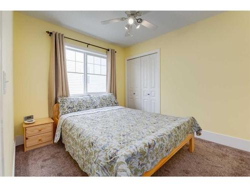 273 Cougartown Circle Sw, Calgary, AB - Indoor Photo Showing Bedroom