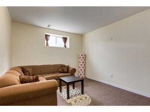 273 Cougartown Circle Sw, Calgary, AB - Indoor Photo Showing Living Room