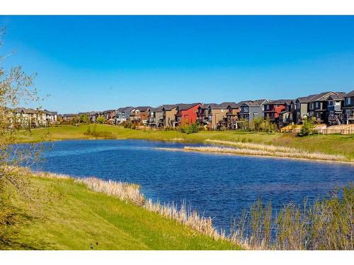 273 Cougartown Circle Sw, Calgary, AB - Outdoor With Body Of Water With View