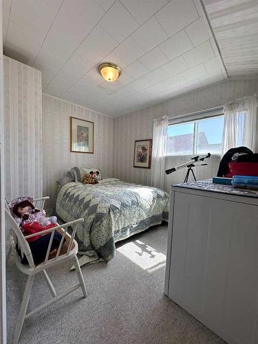 2318 77 Street, Coleman, AB - Indoor Photo Showing Bedroom