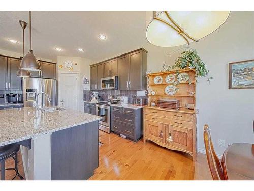 55 Ranchers Crescent, Okotoks, AB - Indoor Photo Showing Kitchen With Upgraded Kitchen
