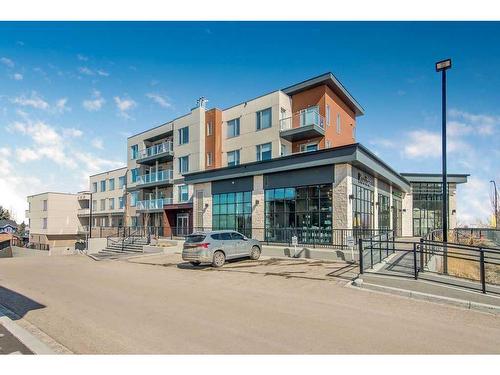 409-30 Shawnee Common Sw, Calgary, AB - Outdoor With Facade