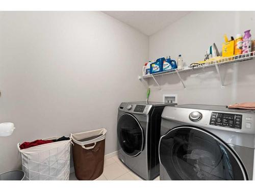 65 Howse Common Ne, Calgary, AB - Indoor Photo Showing Laundry Room