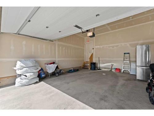 65 Howse Common Ne, Calgary, AB - Indoor Photo Showing Garage